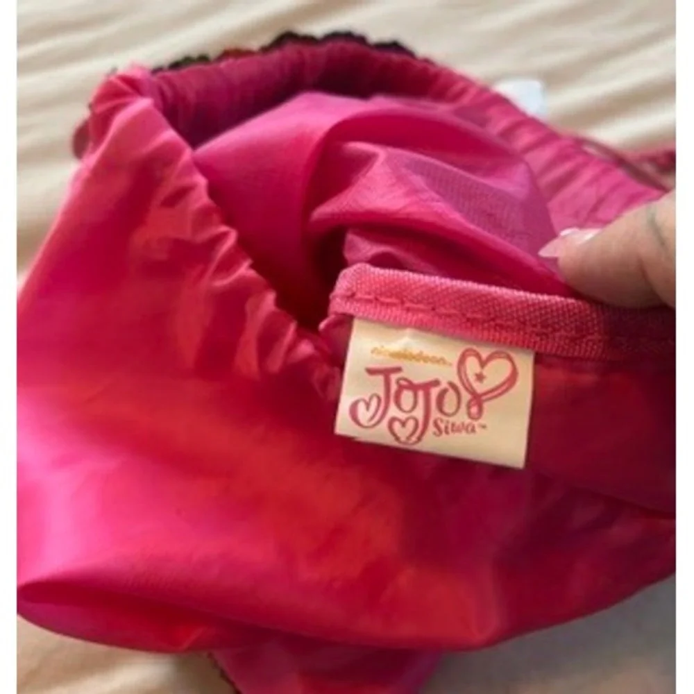 JoJo Siwa DREAM The Tour Rainbow Flip Sequin Drawstring Bag with White Bow Pink